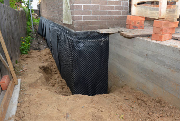Happy homeowners after waterproofing job in Crossville